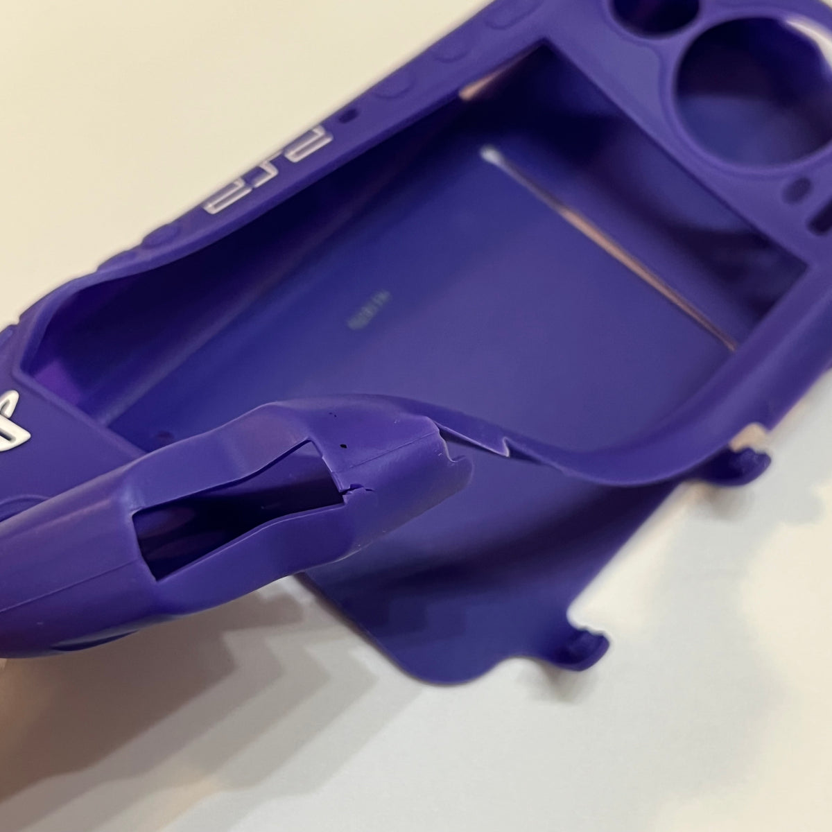 Purple pdp PSP 3000 Silicone Sleeve (small tear)