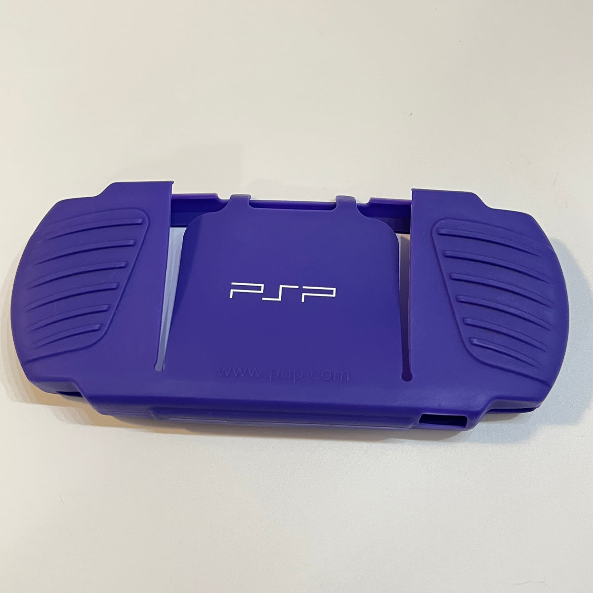 Purple pdp PSP 3000 Silicone Sleeve (small tear)