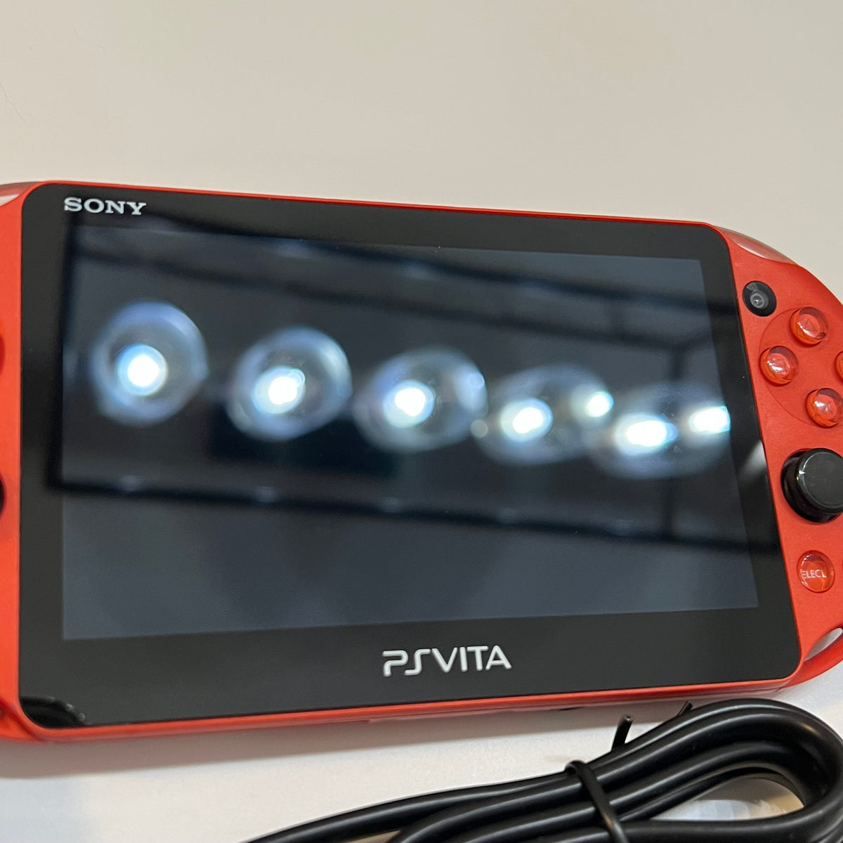 Metallic Red Sony PS Vita 2000 System