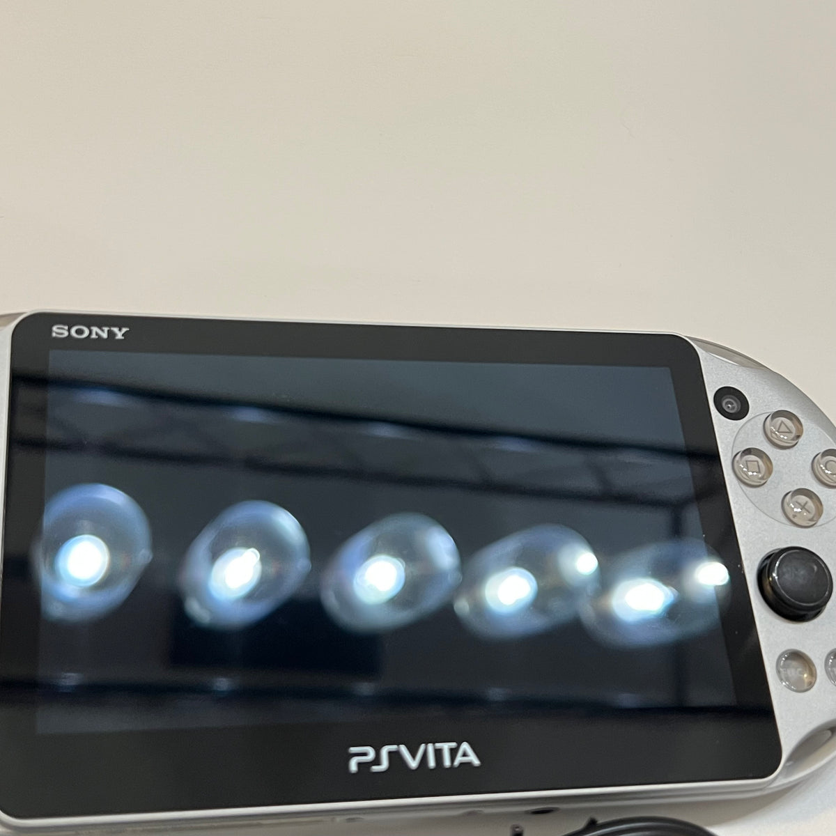 Silver Sony PS Vita 2000 System