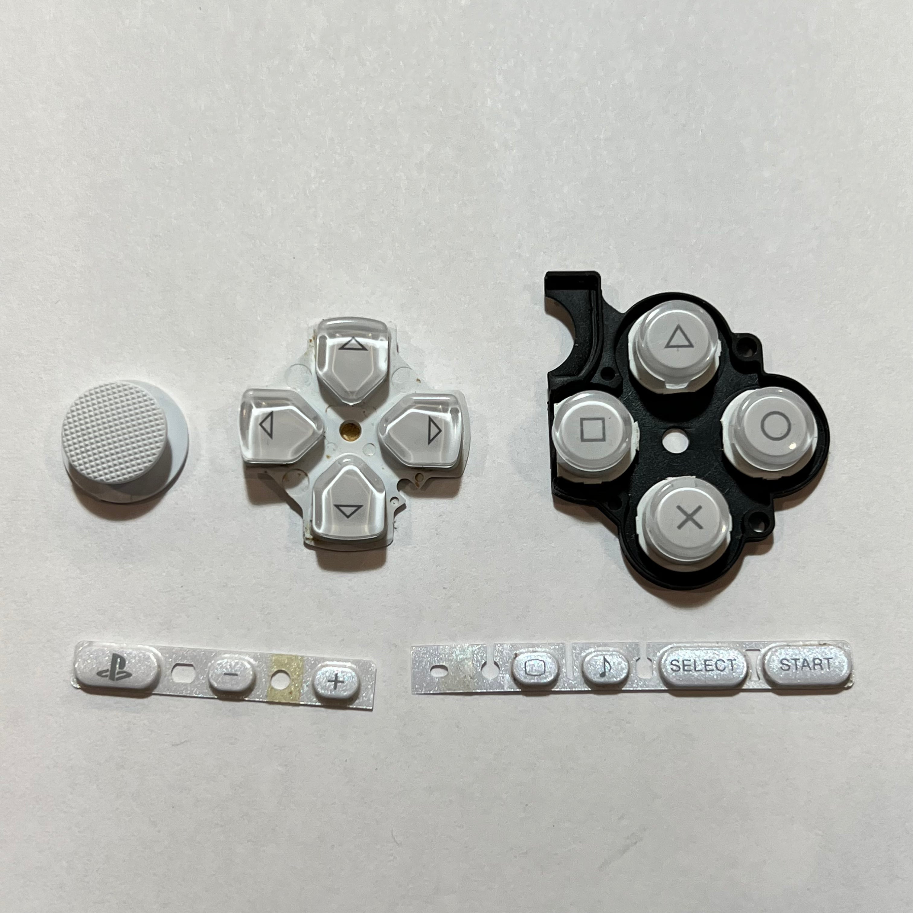 thumbnail image 2 of OEM Sony Black PSP 3000 D-Pad, Right Button Rubber Set & Joystick Cap – Used 2 of 5